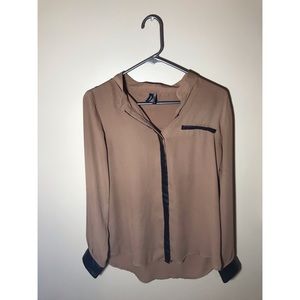 Brown button down dressy shirt.